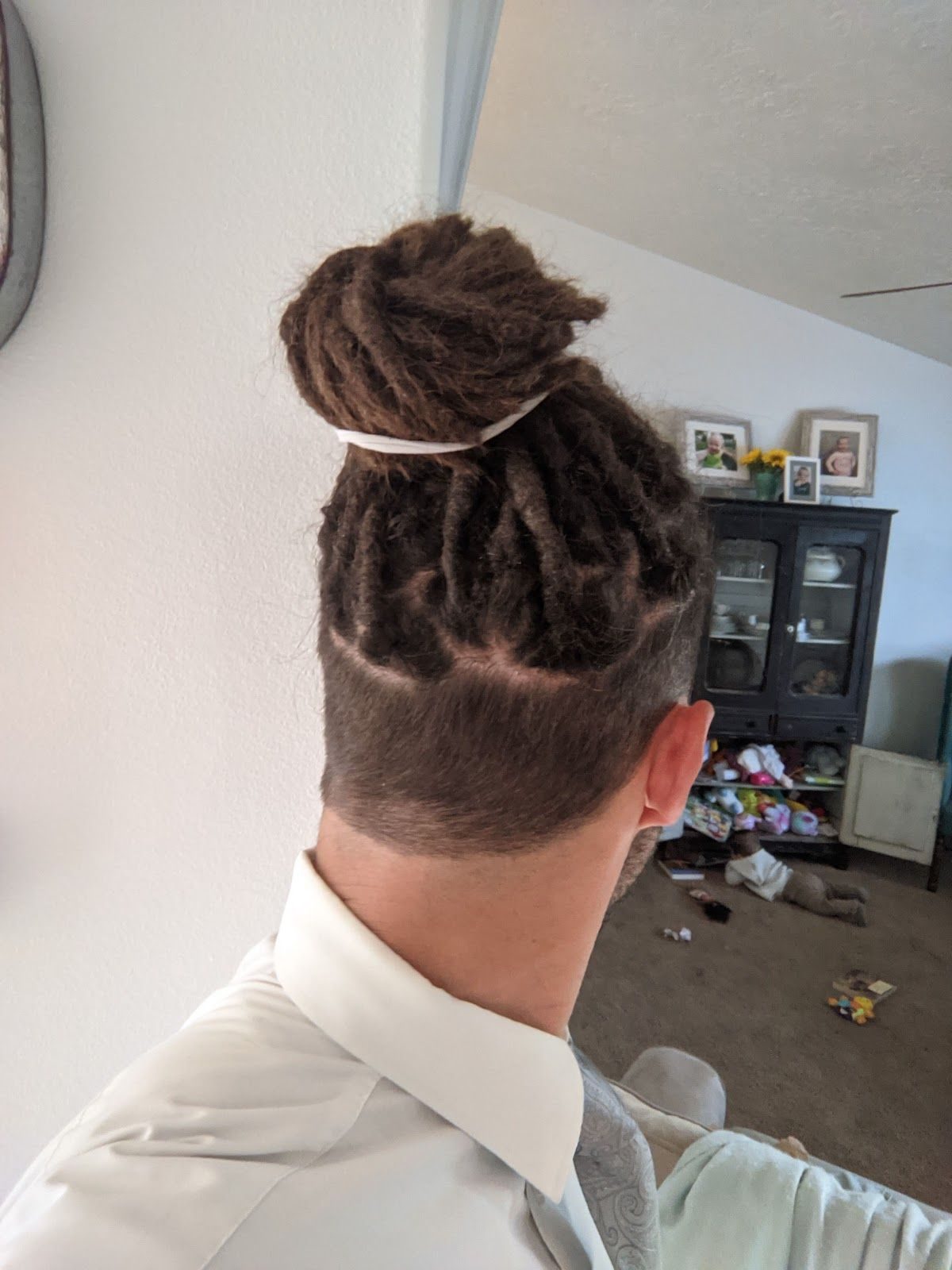 A clean faded undercut by Travis at UpperKutz