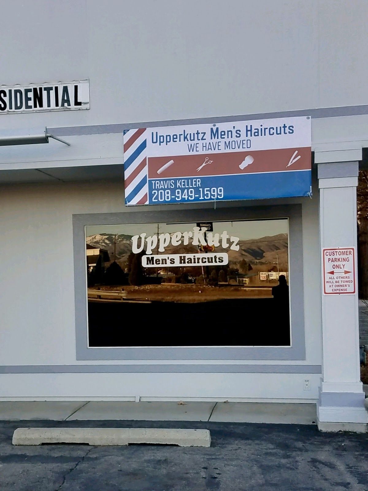 UpperKutz storefront and men's haircuts banner in Garden City